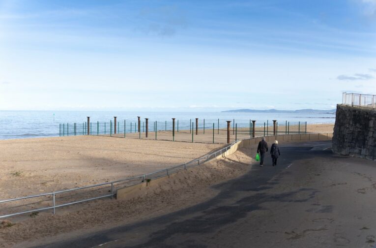 The site of Colwyn Bay Pier in 2019, showing surviving metal columns.